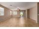 Spacious living room with tile flooring and sliding door access to the outdoor area at 47719 N Camino Del Sol --, Gold Canyon, AZ 85118