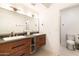 Modern bathroom featuring a double sink vanity with unique hardware and a separate water closet at 5505 E Mclellan Rd # 111, Mesa, AZ 85205