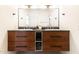 Modern bathroom featuring a floating wood vanity with double sinks and a large, frameless mirror for a sleek and contemporary feel at 5505 E Mclellan Rd # 111, Mesa, AZ 85205