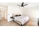 Bright primary bedroom featuring wood floors, neutral walls, and simple decor at 5505 E Mclellan Rd # 111, Mesa, AZ 85205