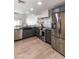 Bright kitchen showcasing a stainless steel refrigerator, modern countertops and stainless steel appliances at 5505 E Mclellan Rd # 111, Mesa, AZ 85205