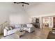 Open-concept living area with comfortable seating, open to kitchen and dining area at 5505 E Mclellan Rd # 111, Mesa, AZ 85205