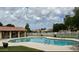 Community pool area with lounge seating and a covered patio at 5505 E Mclellan Rd # 111, Mesa, AZ 85205