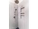 Modern shower with a rainfall showerhead, handheld sprayer, and built-in shelving for a luxurious bathing experience at 5505 E Mclellan Rd # 111, Mesa, AZ 85205