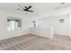 Spacious loft with neutral carpet, a ceiling fan, and lots of bright natural light at 6641 N Desert Shadow Ln, Phoenix, AZ 85014