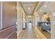 Elegant foyer with decorative ceilings, tile flooring, and open view to the dining and living areas at 6918 E Ivyglen St, Mesa, AZ 85207
