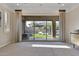 Sun-filled main bedroom with backyard views showcasing the pool, patio, and landscaping at 6918 E Ivyglen St, Mesa, AZ 85207