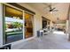 Inviting covered patio offering seamless indoor-outdoor living with views of the pool and backyard at 6918 E Ivyglen St, Mesa, AZ 85207