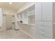 Spacious walk-in closet offering custom shelving, storage, and ample space for organization at 6918 E Ivyglen St, Mesa, AZ 85207