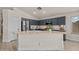 Bright kitchen featuring stainless steel appliances, plenty of cabinet space, and a convenient peninsula at 7701 E Portobello Ave, Mesa, AZ 85212