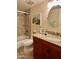 Bathroom with shower over tub, granite countertop and tile flooring at 7960 E Camelback Rd # 109, Scottsdale, AZ 85251