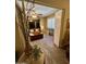 View of the living room with ceiling fan and wood-look flooring at 7960 E Camelback Rd # 109, Scottsdale, AZ 85251