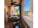 Relaxing patio area with nice view and ceiling fan at 7960 E Camelback Rd # 109, Scottsdale, AZ 85251