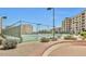 Well-maintained tennis courts surrounded by lush landscaping, perfect for sports enthusiasts at 7960 E Camelback Rd # 109, Scottsdale, AZ 85251