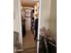 Walk-in closet with organized shelving and hanging space, providing ample storage solutions at 7960 E Camelback Rd # 109, Scottsdale, AZ 85251