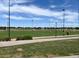 Well-maintained sports field with lighting, providing ample space for recreational activities and community events at 8245 E Bell Rd # 103, Scottsdale, AZ 85260