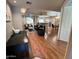 Spacious living room with hardwood floors, modern furniture, and lots of natural light at 8245 E Bell Rd # 103, Scottsdale, AZ 85260