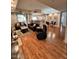 Hardwood floors, modern furnishings, and ample natural light highlight this open living space at 8245 E Bell Rd # 103, Scottsdale, AZ 85260