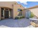 Exterior patio with a small table and chairs that's perfect for enjoying the outdoors at 8248 E Arroyo Hondo Rd, Scottsdale, AZ 85266