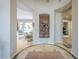 Inviting foyer featuring living spaces, elegant lighting, and art at 8248 E Arroyo Hondo Rd, Scottsdale, AZ 85266