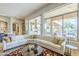 Open living room with outdoor views and comfortable furnishings at 8248 E Arroyo Hondo Rd, Scottsdale, AZ 85266