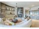 Comfortable living room with fireplace, custom built-ins, and neutral décor at 8248 E Arroyo Hondo Rd, Scottsdale, AZ 85266