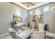 Well-lit office space with a modern desk, comfortable chair, and stylish decor, perfect for focused work at 8248 E Arroyo Hondo Rd, Scottsdale, AZ 85266