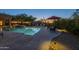 Inviting backyard pool featuring desert landscaping, lounge seating and mountain views at 8248 E Arroyo Hondo Rd, Scottsdale, AZ 85266