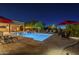 Stunning pool area with lounge chairs and umbrellas, perfect for outdoor entertaining at 8248 E Arroyo Hondo Rd, Scottsdale, AZ 85266