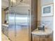 Stainless steel refrigerator with custom wood cabinetry and granite countertops in the kitchen area at 8248 E Arroyo Hondo Rd, Scottsdale, AZ 85266