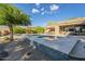 An in-ground pool featuring a baja shelf and views of the desert landscape at 8248 E Arroyo Hondo Rd, Scottsdale, AZ 85266