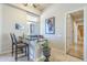Elegant wet bar with granite countertop, stylish seating, and views to the outdoors, perfect for entertaining guests at 8248 E Arroyo Hondo Rd, Scottsdale, AZ 85266