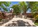 Outdoor kitchen area with a built-in grill, bar, and seating, perfect for entertaining and outdoor cooking at 850 W Folley St, Chandler, AZ 85225