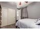 Bedroom with a closet and window with stylish curtains at 850 W Folley St, Chandler, AZ 85225