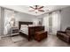 Bedroom with dark wood furniture, neutral walls, and bright natural light at 850 W Folley St, Chandler, AZ 85225