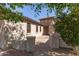 Charming home featuring a stone accent wall, covered entrance, and landscaped pathway at 850 W Folley St, Chandler, AZ 85225
