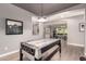 Game room offers an air hockey table and views into other living and dining areas at 850 W Folley St, Chandler, AZ 85225