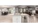 Open concept kitchen with granite countertops, stainless steel appliances, and views into the living area at 850 W Folley St, Chandler, AZ 85225