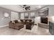 Inviting living room with a plush sectional sofa, stone fireplace and contemporary decor at 850 W Folley St, Chandler, AZ 85225