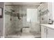 Tiled shower with dual shower heads and a glass enclosure at 850 W Folley St, Chandler, AZ 85225
