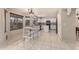 Stylish kitchen with white cabinetry, stainless steel appliances, and ample counter space at 8555 W Purdue Ave, Peoria, AZ 85345
