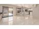Bright kitchen area with modern white cabinets and a convenient breakfast bar at 8555 W Purdue Ave, Peoria, AZ 85345