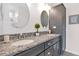 Modern bathroom with granite counter tops, double sinks and plentiful storage at 93 E Santa Lucia Ln, Queen Creek, AZ 85140