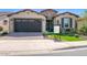 Beautiful single-story home with a 2-car garage and meticulously kept landscaping at 93 E Santa Lucia Ln, Queen Creek, AZ 85140