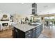 Spacious kitchen with large island, modern appliances, and an open floor plan at 93 E Santa Lucia Ln, Queen Creek, AZ 85140