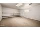 Bonus room with large open space and built-in shelving at 9622 N 112Th Ave, Sun City, AZ 85351
