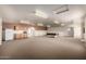 Spacious bonus room with carpeting, pool table, refrigerator, and sink at 9622 N 112Th Ave, Sun City, AZ 85351