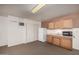 Bonus room boasts a refrigerator, sink and lots of storage at 9622 N 112Th Ave, Sun City, AZ 85351