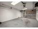 Spacious garage features built-in storage, work bench, and two skylights at 9622 N 112Th Ave, Sun City, AZ 85351