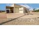 Three-car garage with covered parking on a concrete driveway and desert landscaping at 9622 N 112Th Ave, Sun City, AZ 85351